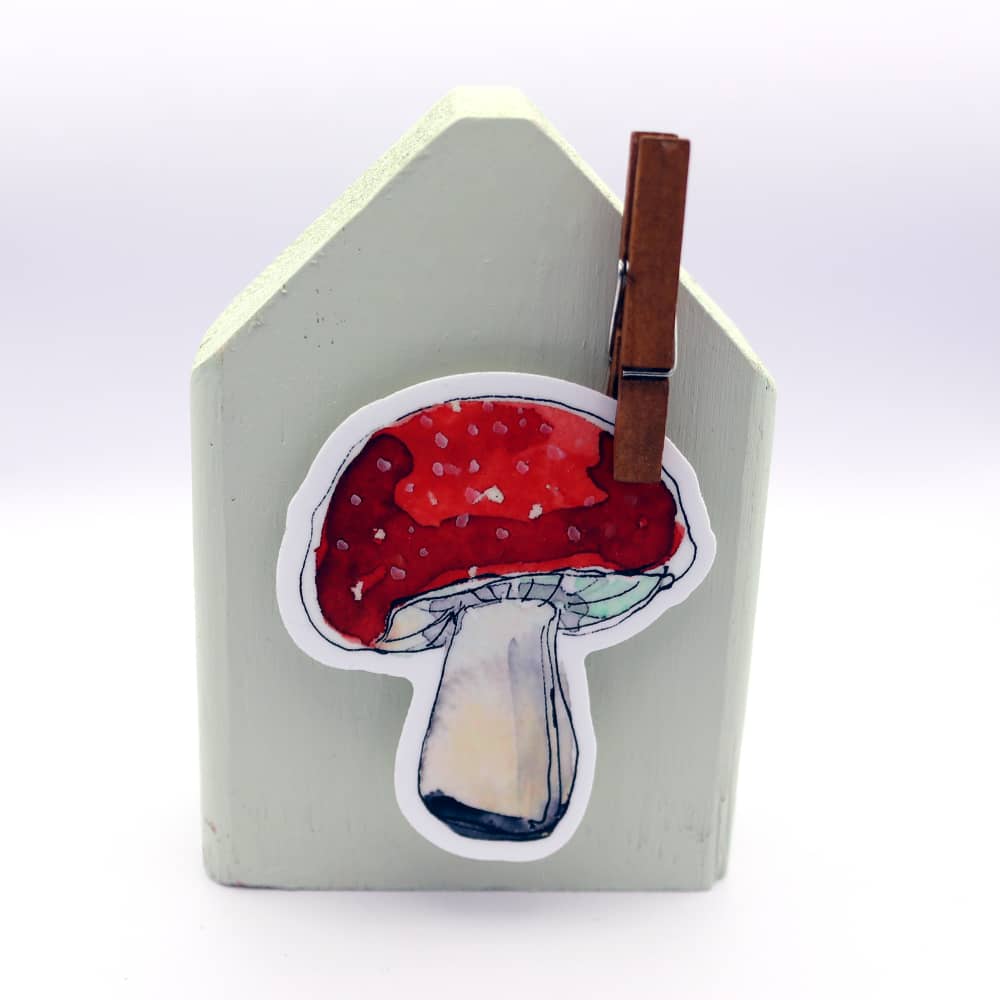 a sticker of a mushroom on a house